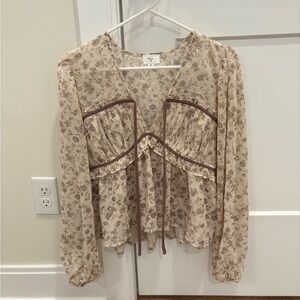 Chic Floral Beige Blouse with Brown Trim